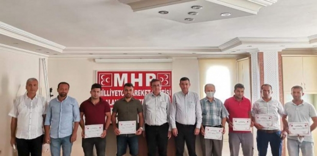 Alanya MHP’de mahalle başkanları belgelerini aldı