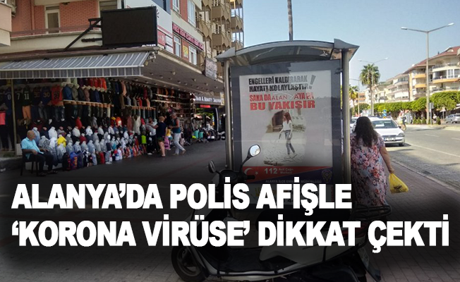 Alanya’da polis afişle ‘korona virüse’ dikkat çekti